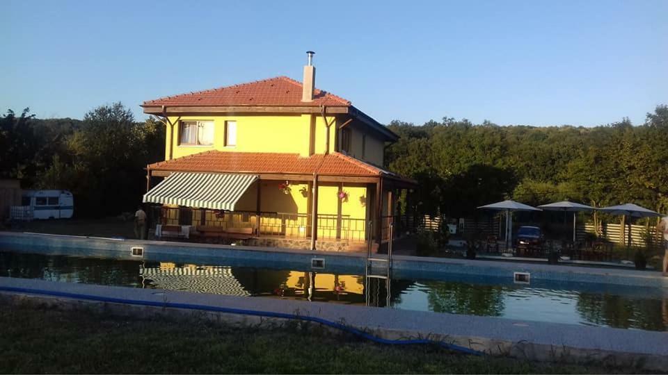 Hotel Pensiunea Casa Vanatorului à Oteleni Extérieur photo