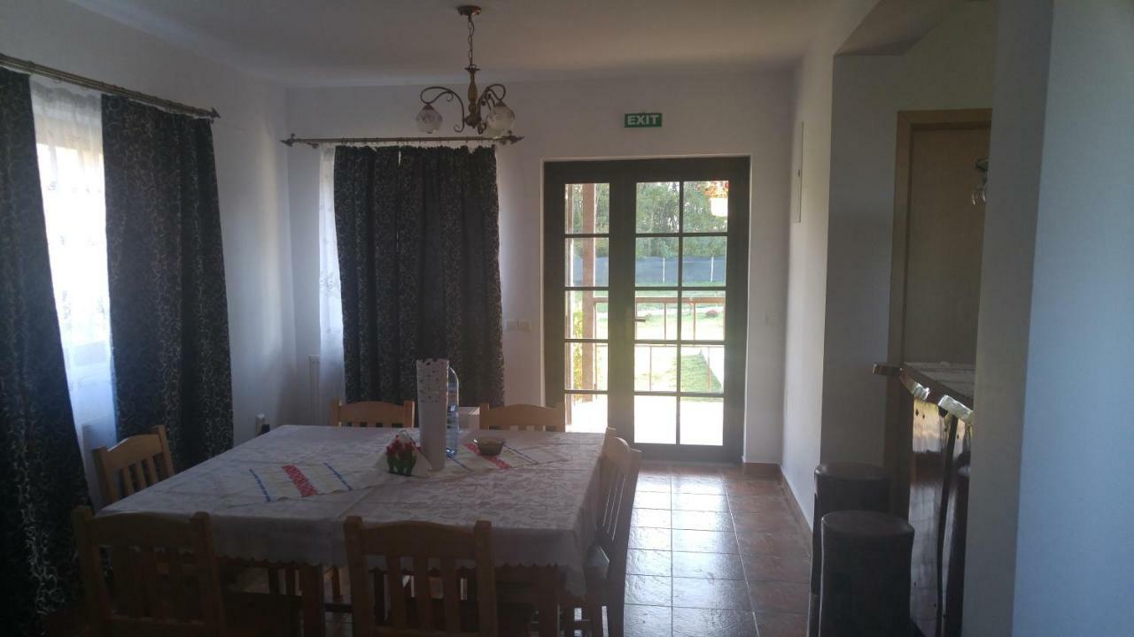 Hotel Pensiunea Casa Vanatorului à Oteleni Extérieur photo